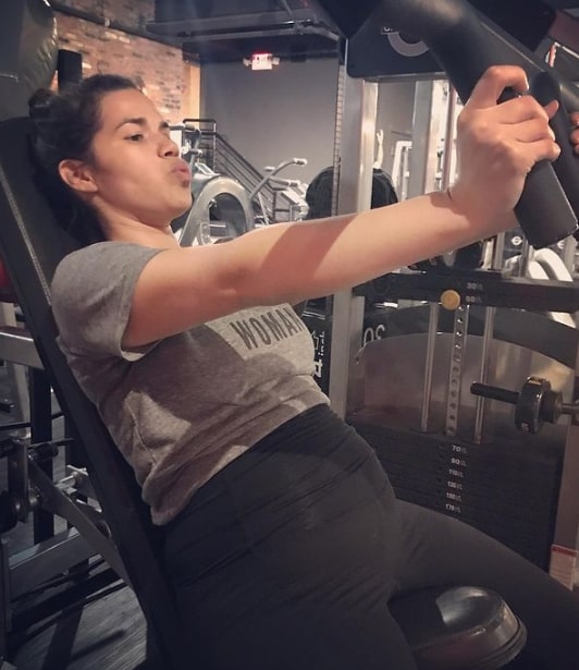 Image of America Ferrera doing her work out routine