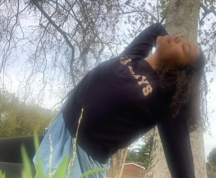 Image of Jaz Sinclair doing Yoga as her exercise routine