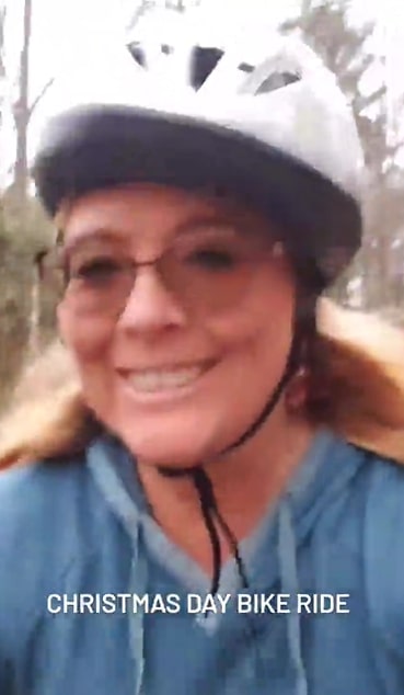Image of Kelly Cass going on a bike ride to exercise