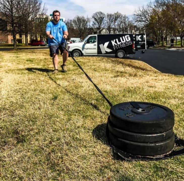 Image of Luke Combs doing his work out routine